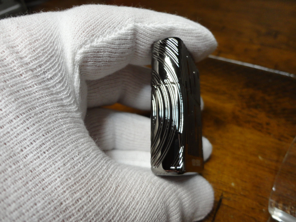 2026 ZIPPO COLLECTIBLE OF THE YEAR GENERATIONS BLACK ICE ARMOR ZIPPO LIGHTER